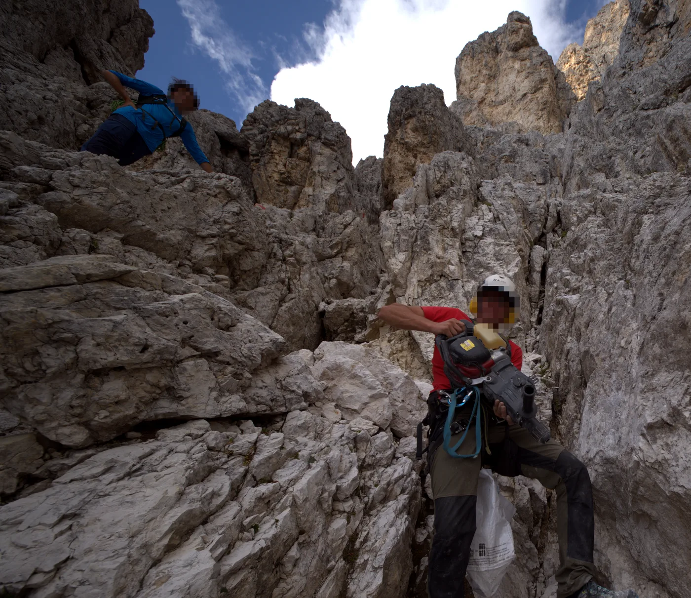 Two climbers in the Dolomites with their faces pixelated by Expedit